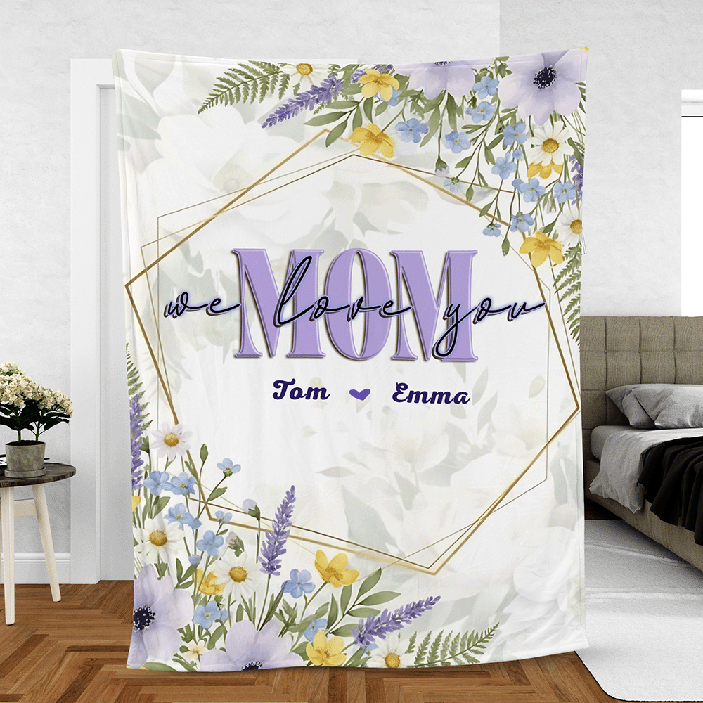White blanket with lavender and wildflower border, purple MOM we love you text and custom kids names