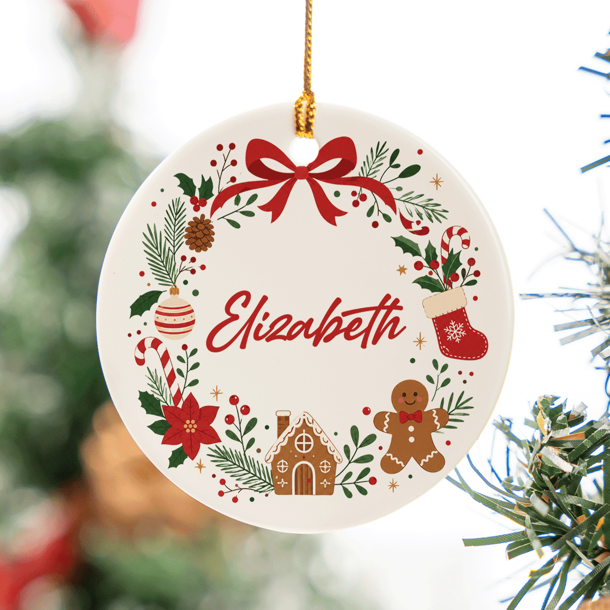 Close up of the bow wreath ceramic ornament with gingerbread and custom name