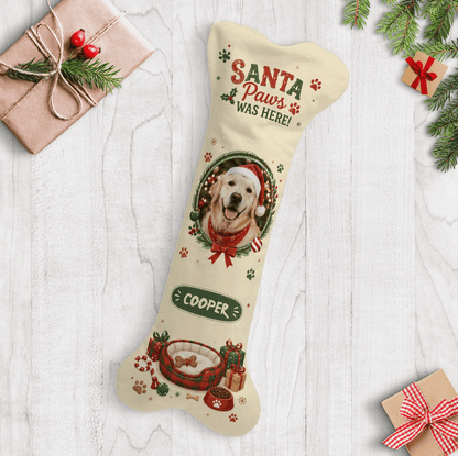 Cream bone shaped Christmas stocking with a custom dog photo, pet name and a cozy dog bed print