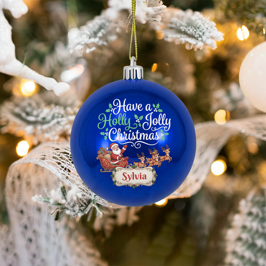 Glossy blue ball ornament printed Have a Holly Jolly Christmas with Santa sleigh and custom name