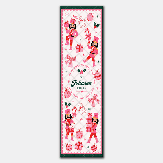 Full length coquette pink nutcracker runner design with drummer nutcrackers, gifts, ornaments and green border