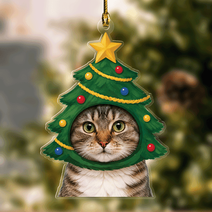 Christmas tree hood cat photo ornament with star topper on a blurred background