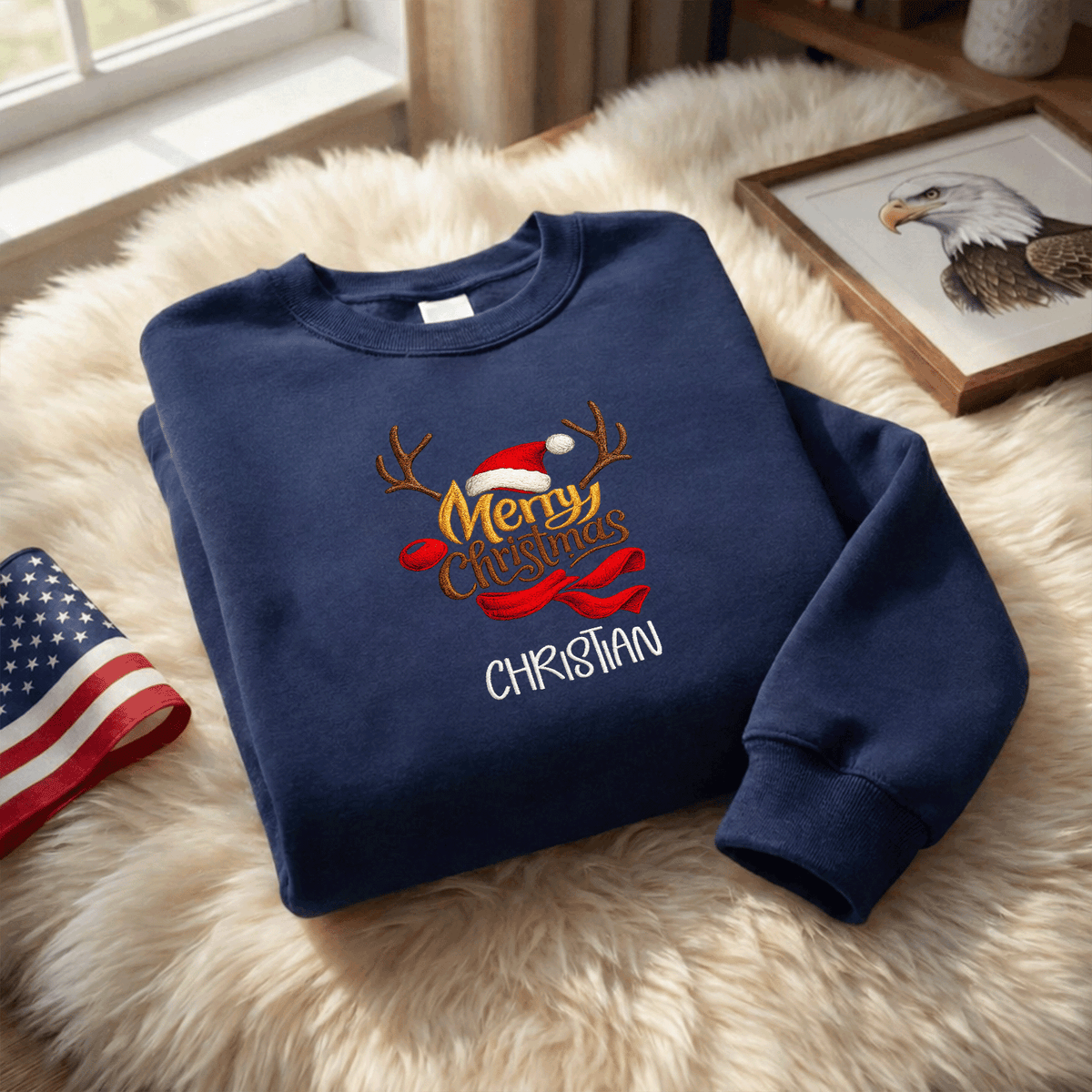 Navy Merry Christmas reindeer antlers sweatshirt on a fur rug with a flag and eagle print