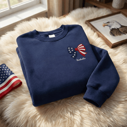 Personalized Christmas American Flag Bow Embroidered Sweatshirt, Custom Name Holiday Crewneck, Patriotic Xmas Gift for Women