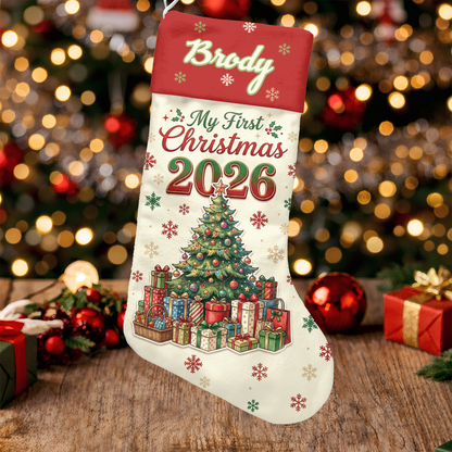Cream stocking with red name cuff, My First Christmas 2026 and a Christmas tree with gifts