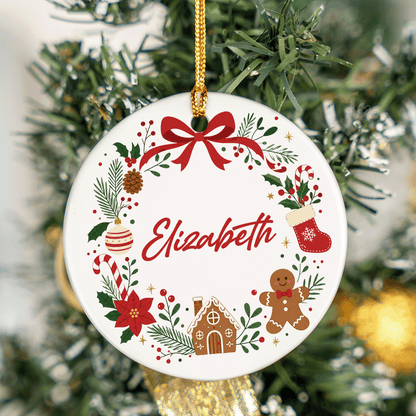 Bow wreath custom name ornament hanging on a green tinsel tree
