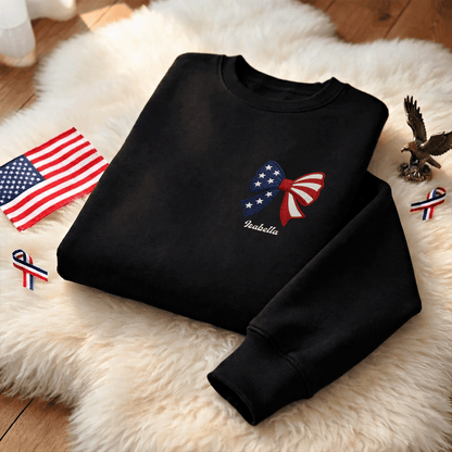 Personalized Christmas American Flag Bow Embroidered Sweatshirt, Custom Name Holiday Crewneck, Patriotic Xmas Gift for Women