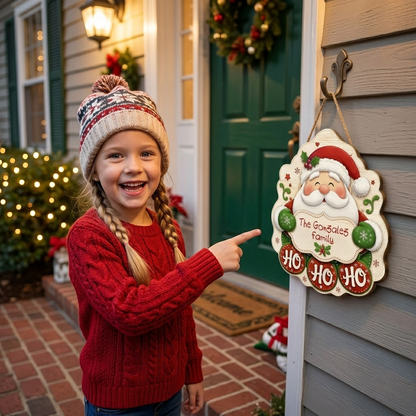 Personalized Smiling Santa Ho Ho Ho Custom Shape Wood Sign, Cute Christmas Door Hanger Custom Family Name Green Mittens Holding Plaque Wooden Sign, Holiday Wall Decor & Family Gift