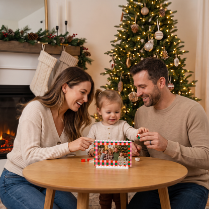 Family assembling the That Holiday Spirit Checkered photo building block frame together by the Christmas tree