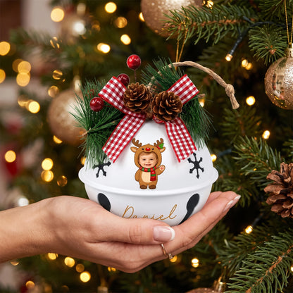 Hand holding a custom baby reindeer photo jingle bell ornament
