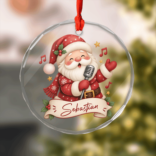 Round clear glass ornament with Santa singing into a microphone, music notes and a custom name banner