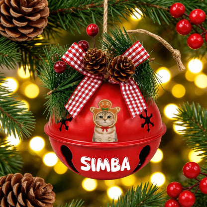 Custom photo gingerbread pet jingle bell ornament hanging among pine branches and holiday lights