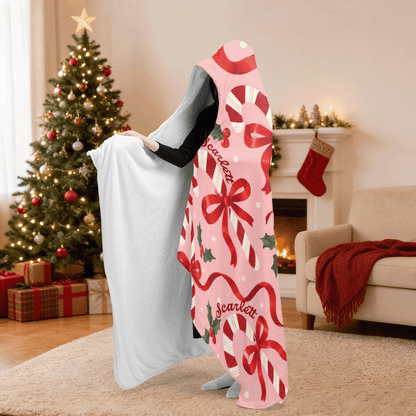 Personalized candy cane ribbon bow holly hooded blanket side view showing the sherpa lining