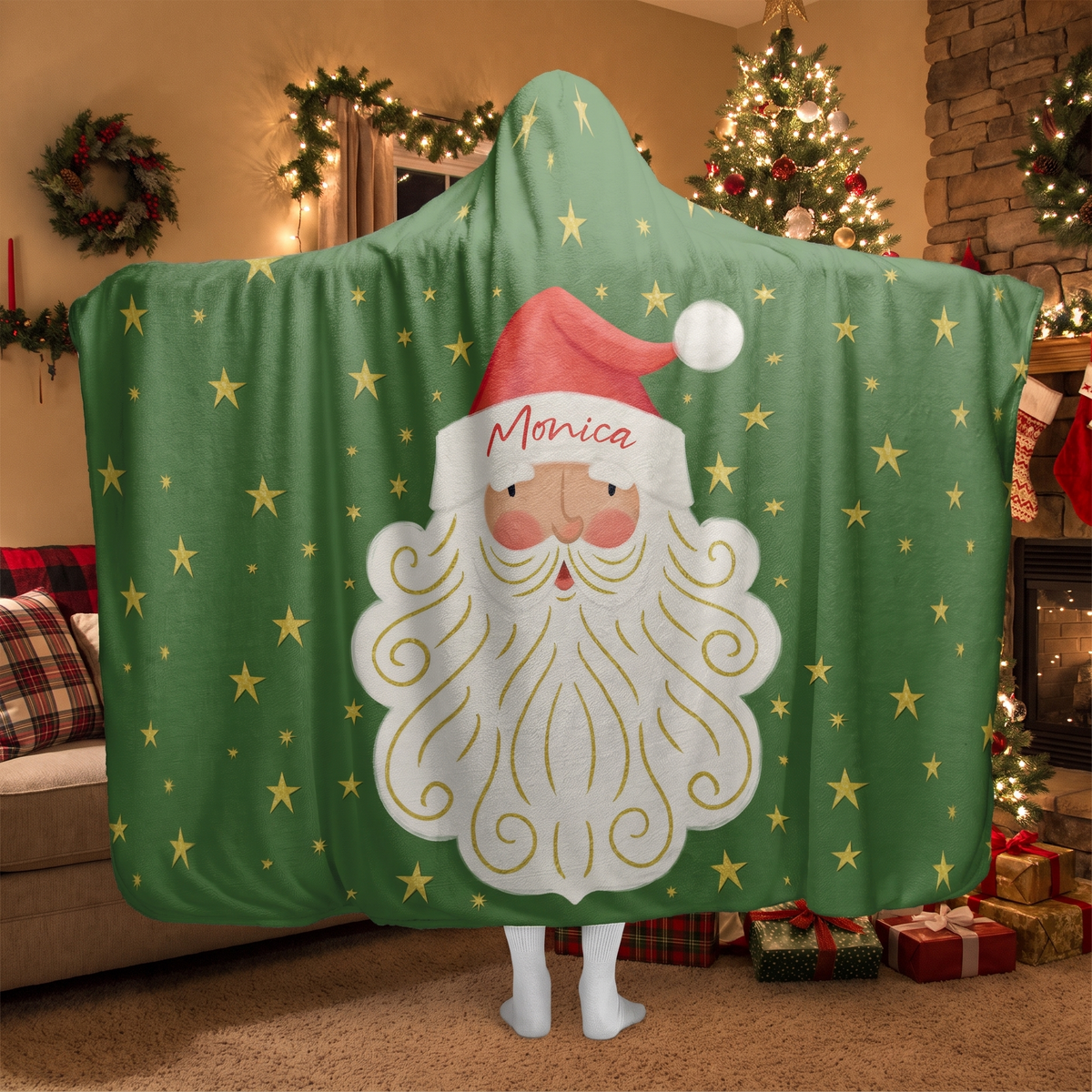 Santa Face Golden Stars hooded blanket worn in a cozy Christmas living room, back view