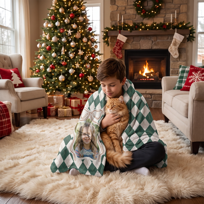 Child wrapped in the custom photo Argyle Bow Frame hooded blanket holding a cat by the Christmas tree