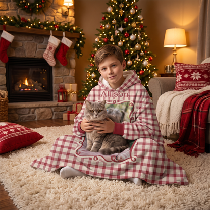 Child wrapped in the custom photo Red Gingham Frame hooded blanket holding a cat by the Christmas tree
