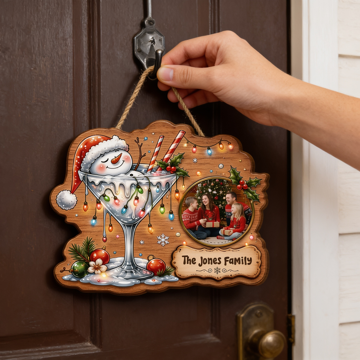 Shop custom Christmas wooden signs! Durable 0.5cm plywood cutout featuring a snowman in a cocktail glass, Christmas lights, custom family photo & personalized plaque!