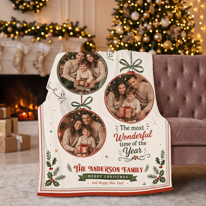 Three photo hanging ornament blanket with custom family name draped over a pink velvet sofa by the fireplace