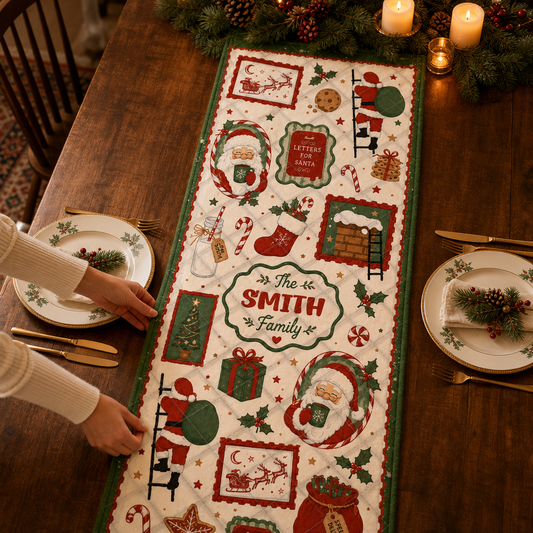 Hands placing a green bordered quilt runner with Santa stamps, stockings, Letters to Santa and custom family name badge
