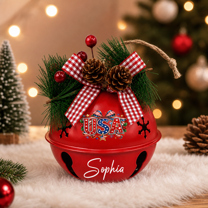 Personalized USA Red Jingle Bell Christmas Ornament, Custom Name Patriotic American Flag Holiday Tree Decor, Rustic Metal Bell with Bow & Pinecone Accents