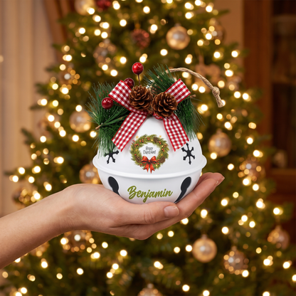 Personalized Merry Christmas Wreath White Jingle Bell Ornament, Custom Name Pine Wreath Holiday Tree Decor, Rustic Metal Bell with Bow & Pinecone Accents
