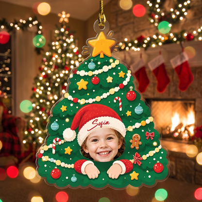 Christmas tree acrylic ornament with a child's face in a Santa hat with custom name, peeking through the garland
