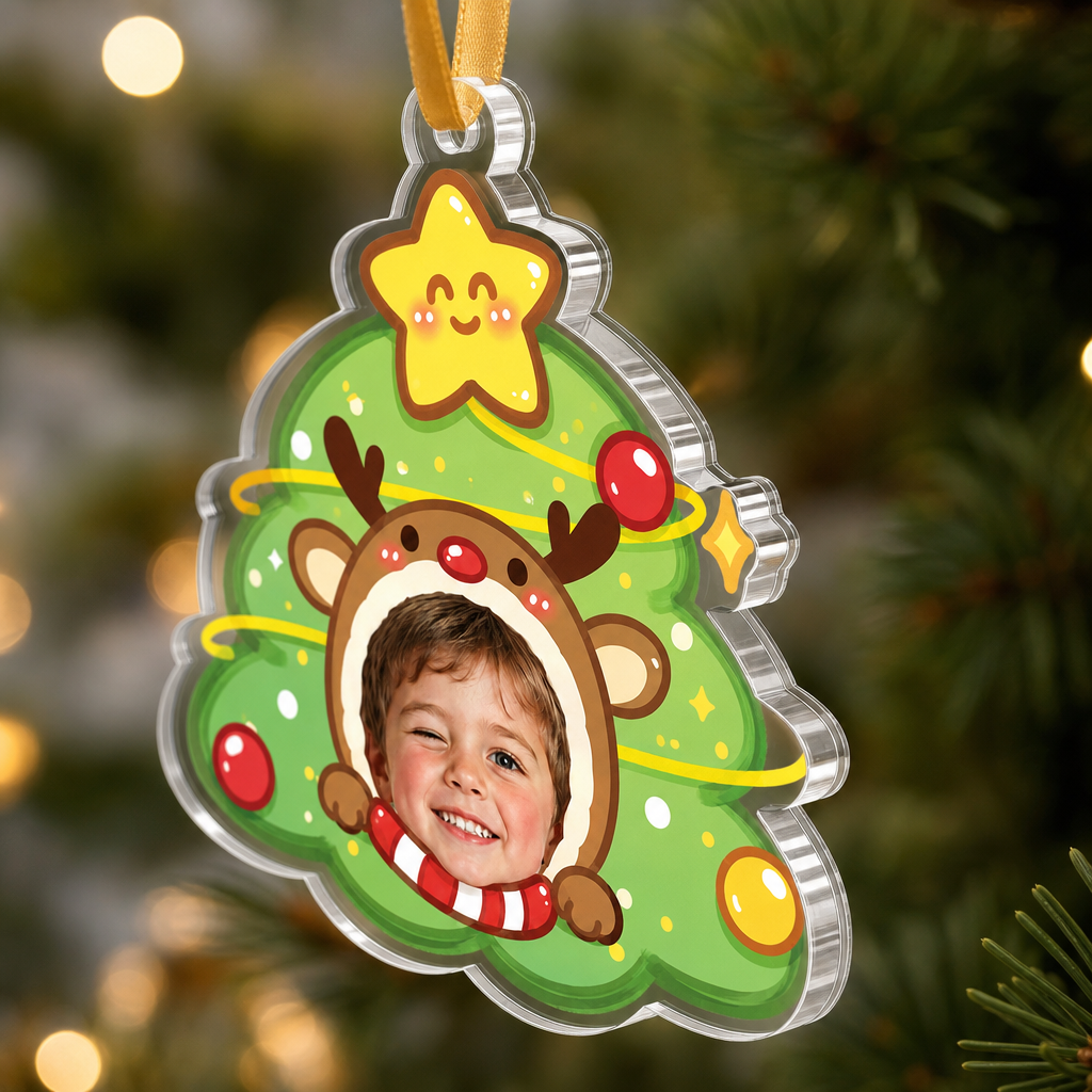 Side view of the clear acrylic reindeer Christmas tree face ornament on a gold ribbon