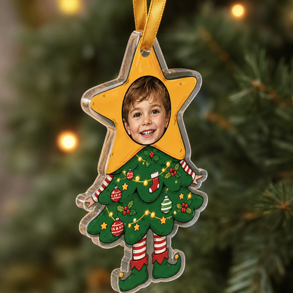 Side view of the clear acrylic star topper Christmas tree costume ornament on a gold ribbon