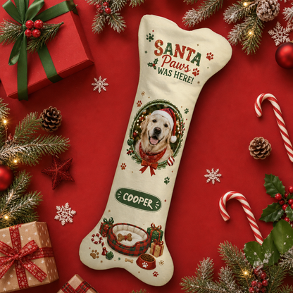 Dog bone Christmas stocking with a golden retriever photo in a Santa hat and the name Cooper on a red background