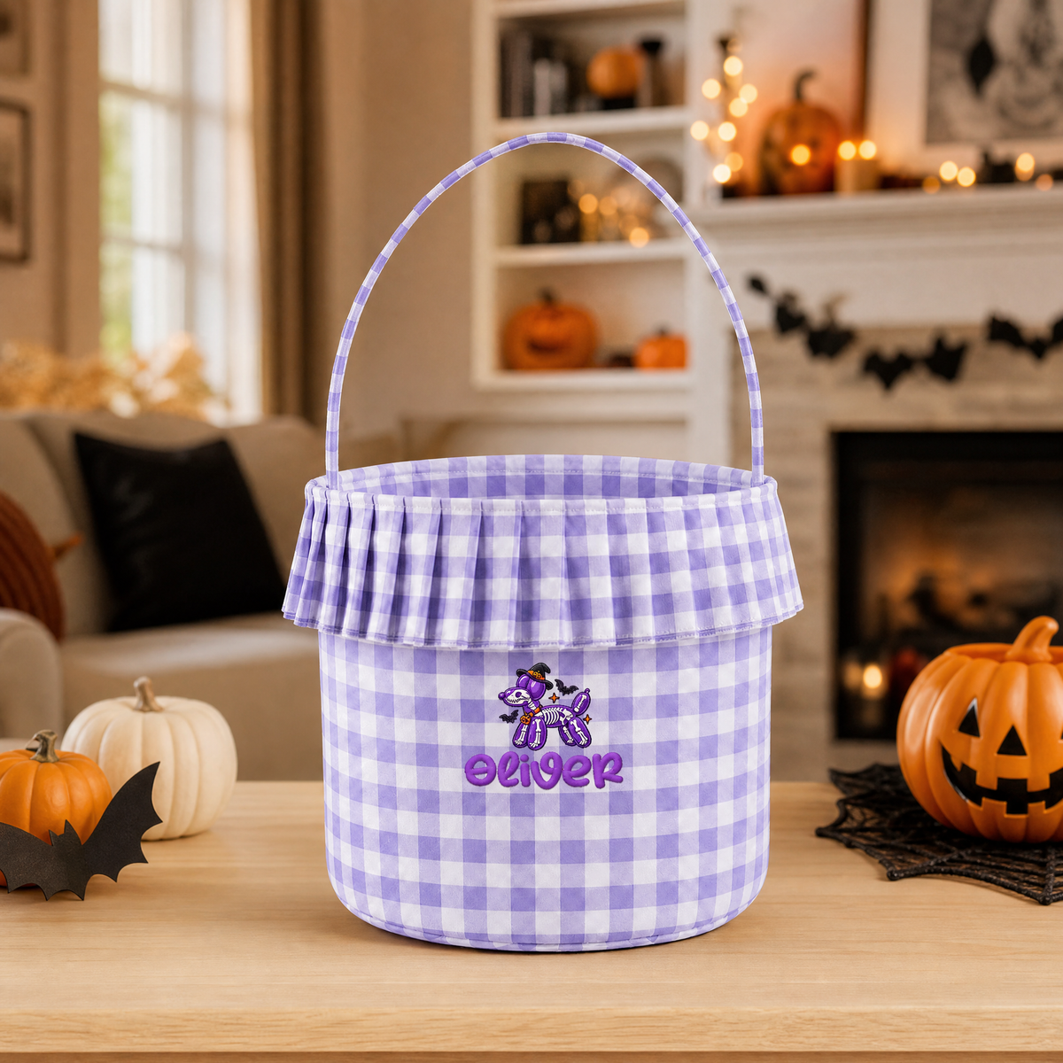 Purple gingham ruffle basket with 3D puff embroidered skeleton balloon dog and custom name on a table by a fireplace