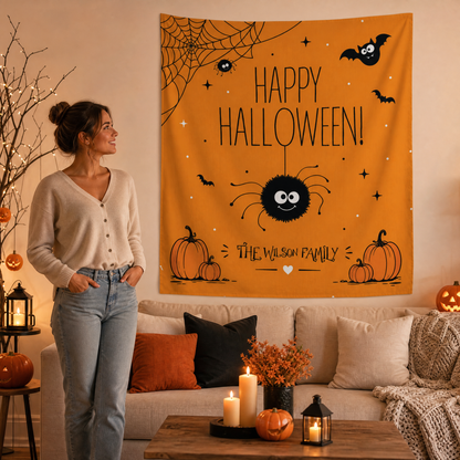 Woman standing by the orange Happy Halloween spider tapestry in a candlelit living room
