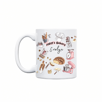 Personalized MOM's Bakery mug with bread loaf, pink stand mixer, flour and kitchen scale illustrations and custom name
