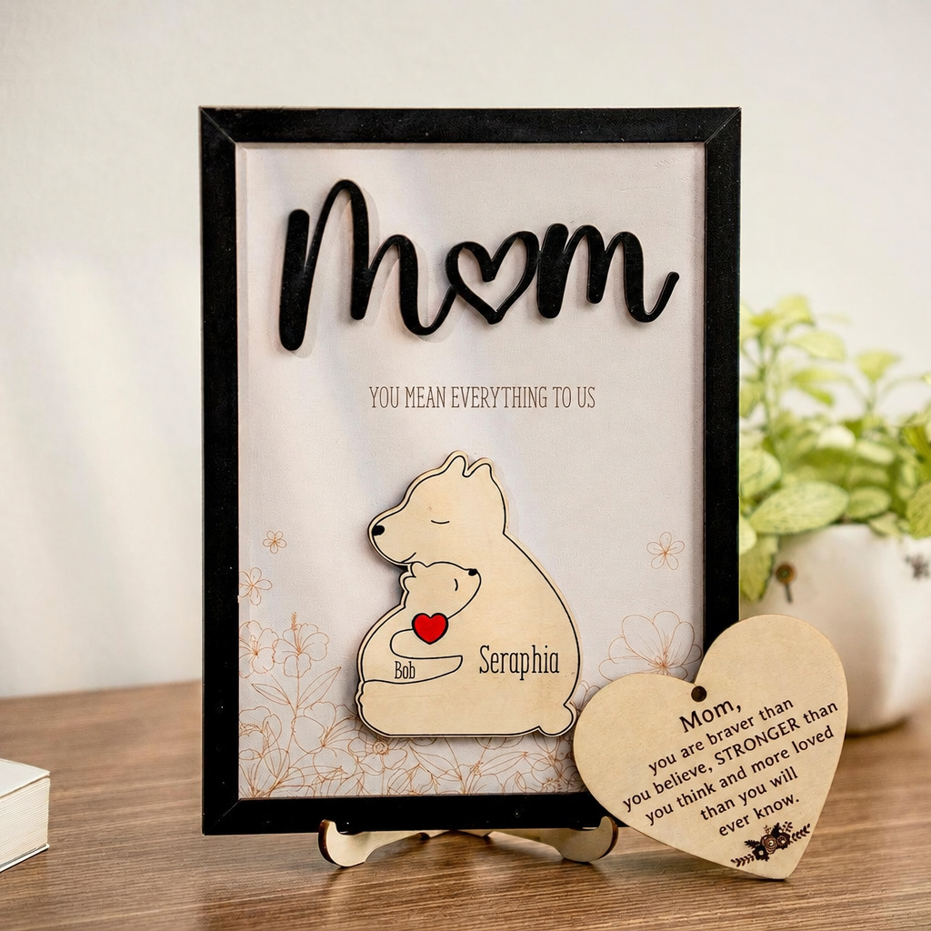 Black framed Mom You mean everything to us sign with mama and baby bear cutout, custom names and a heart shaped message tag on a stand
