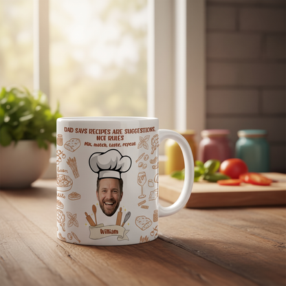 Dad Says Recipes Are Suggestions Not Rules mug with custom face on a wooden counter by tomatoes and a sunny window