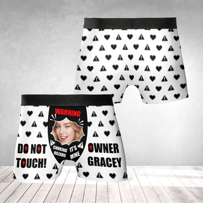 White men's boxer briefs with black hearts, warning icons and custom photo face reading Choking Hazard and Do Not Touch