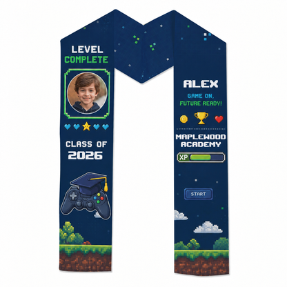Navy video game kid graduation stole with child photo, Level Complete, name Alex, Class of 2026 and Maplewood Academy, flat product view