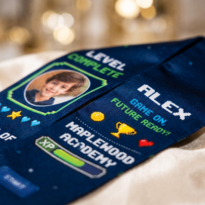 Close-up of the Level Complete video game kid stole showing child photo, Alex, Game On Future Ready and Maplewood Academy