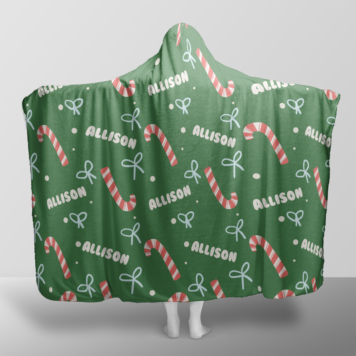 Personalized candy cane bow pattern Christmas hooded blanket with custom name, back view