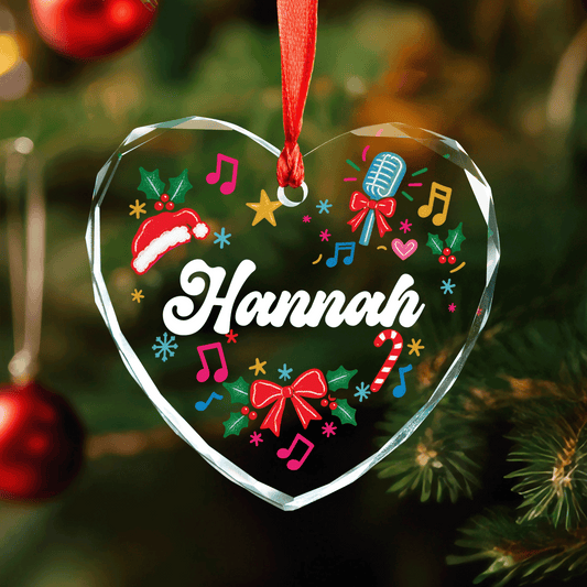 Heart shaped clear glass ornament with a microphone, music notes, Santa hat and a custom name