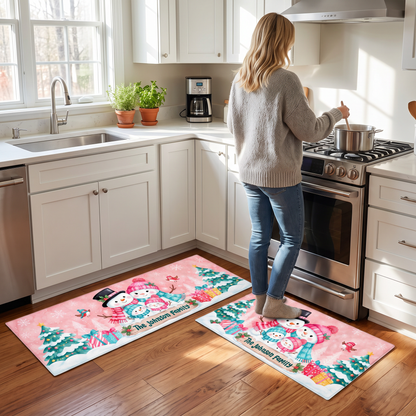 Personalized Snowman Family Hug Christmas kitchen mat set in a cozy holiday kitchen