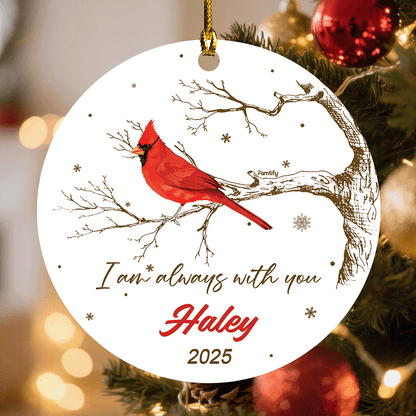 Round ceramic memorial ornament with a red cardinal on a bare branch, I Am Always with You, a name and 2025