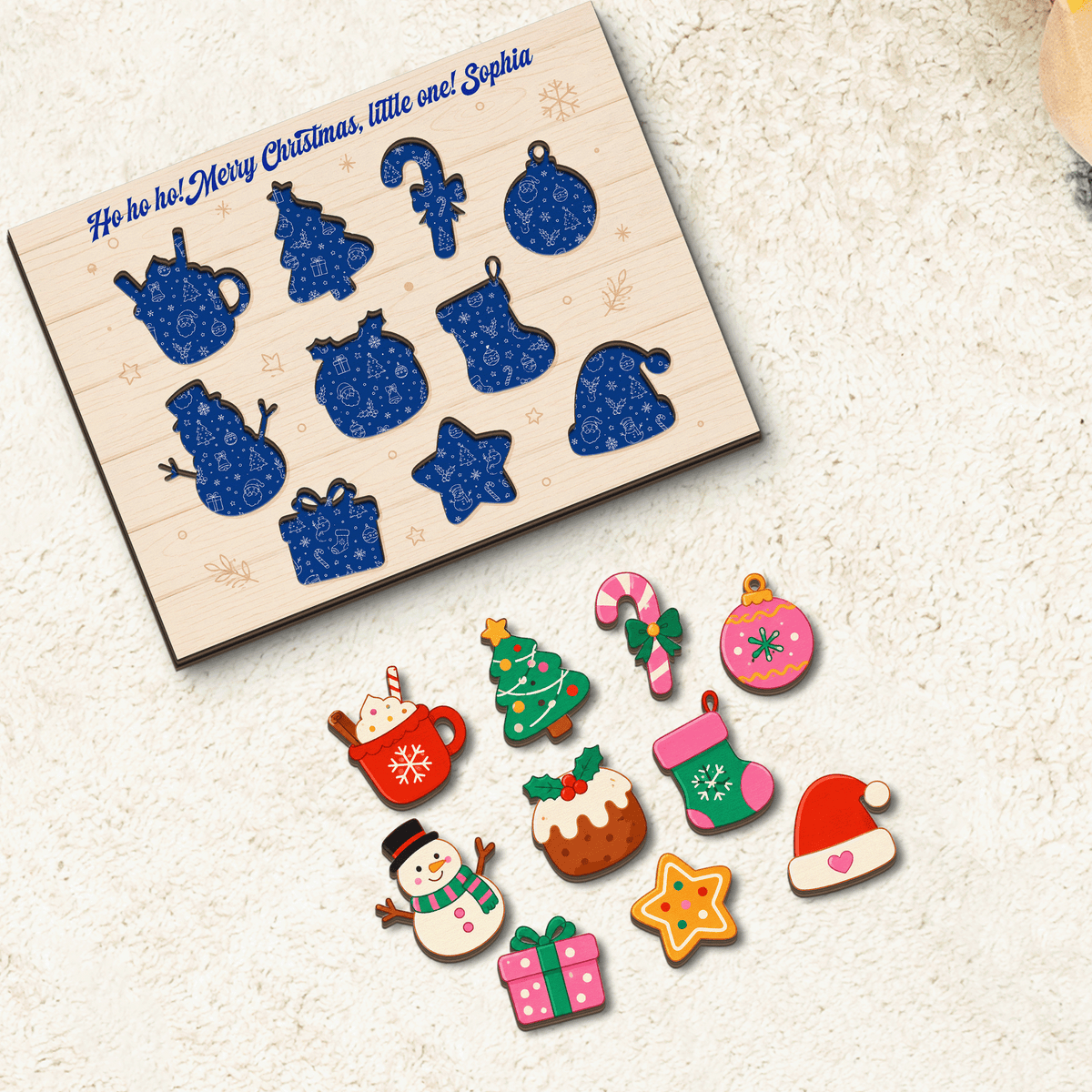Personalized Ho Ho Ho little one wooden puzzle board with pieces removed showing patterned slots