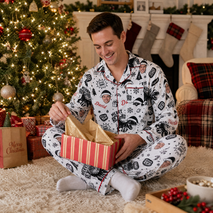 Man opening a gift in custom dinosaur Merry Rexmas Christmas pajamas