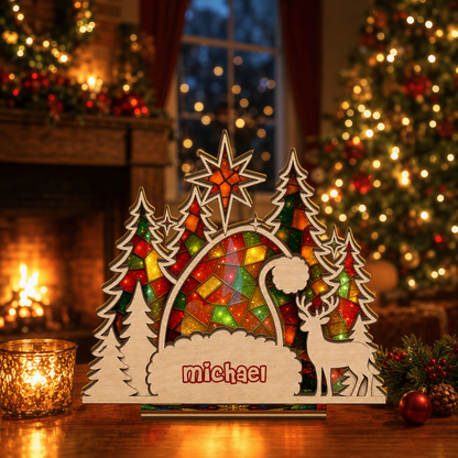 Personalized Santa hat name suncatcher candle holder glowing on holiday table