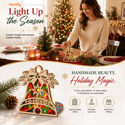 Christmas bell suncatcher candle holder glowing on holiday table