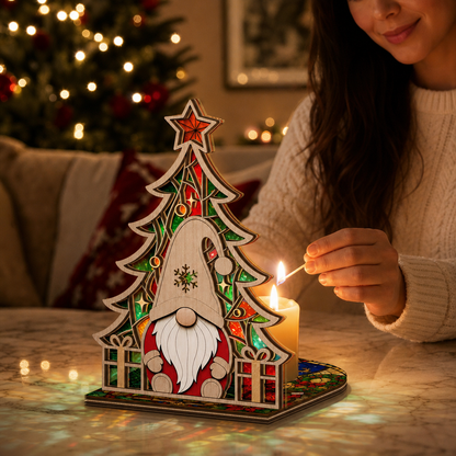 Christmas gnome and tree suncatcher candle holder glowing on holiday table
