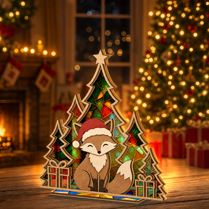 Christmas fox suncatcher candle holder glowing on holiday table
