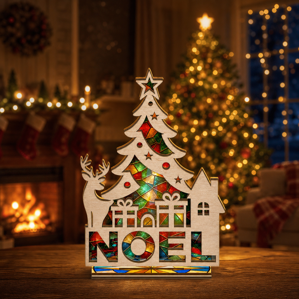 Christmas NOEL suncatcher candle holder glowing on holiday table
