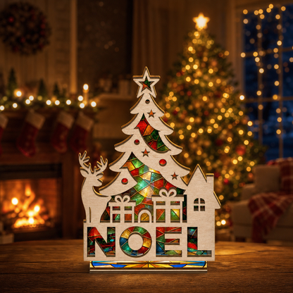 Christmas NOEL suncatcher candle holder glowing on holiday table