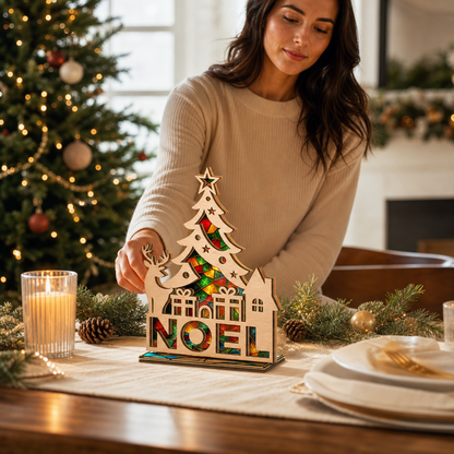 Christmas NOEL suncatcher candle holder glowing on holiday table